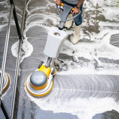 Machine floor washing